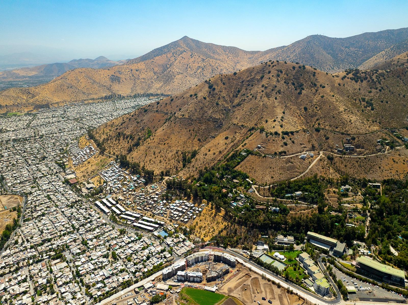 Unequal Scenes Chile - Cerro San Cristobal separates poorer neighborhoods from the wealthy parts of downtown Santiago